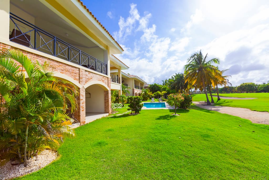 View of the balcony. The private pool is right near your apartment. Book it now!