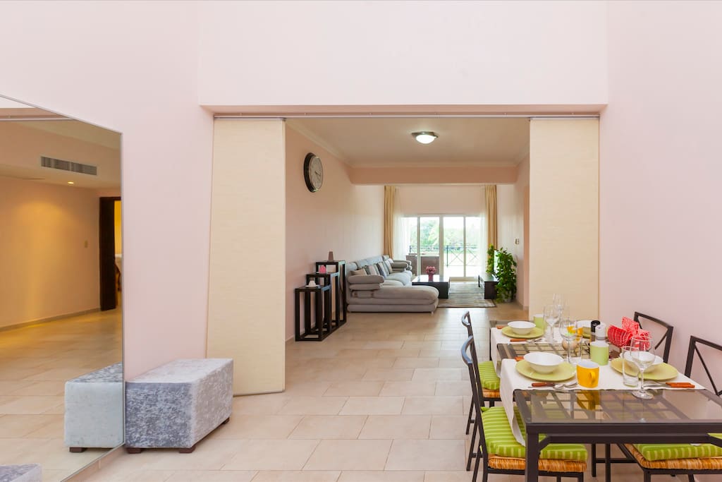 Dining area, view of the living room. Just imagine ... you're taking your coffee or tea and enjoying these stunning views, lovely nature, or just sitting at an exclusive, comfortable sofa and watching TV.