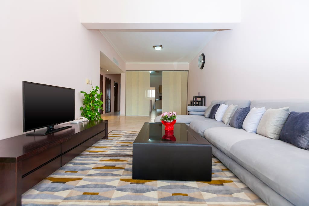 Lovely living room. With exclusive sofa and flat screen TV to enjoy your time and relax on this huge sofa with your friends and family
