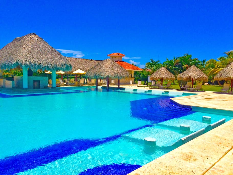 Luxury 5-star hotel style swimming pool. You can swim here or just relax, sipping your cocktail right from the swimming pool bar.