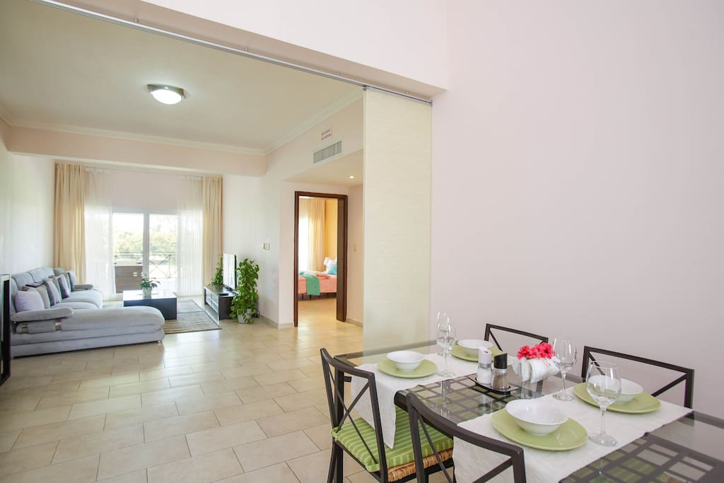 The dining area opens a view to the lounge area, it's very roomy and airy