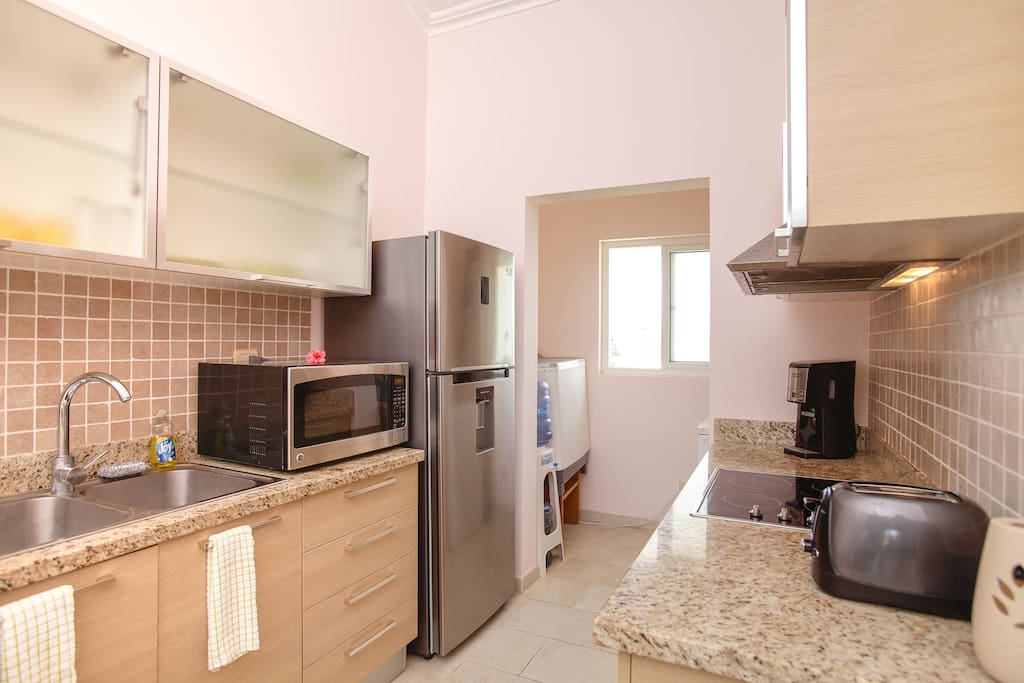 Just have a look at our cute kitchen. You will find here
+Fridge
+Microwave
+Toaster
+ Coffee maker
