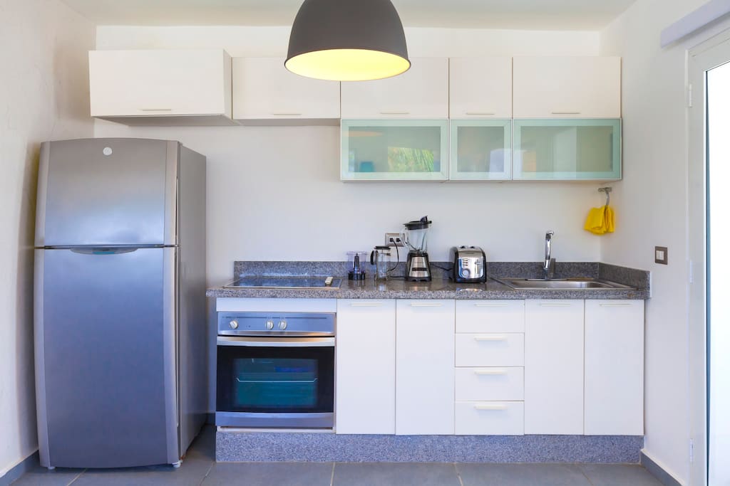 All you need, for your comfortable staying in the apartment. The kitchen is fully-equipped with oven, fridge, coffee maker, toaster, blender, you will find other tableware in the cupboards.