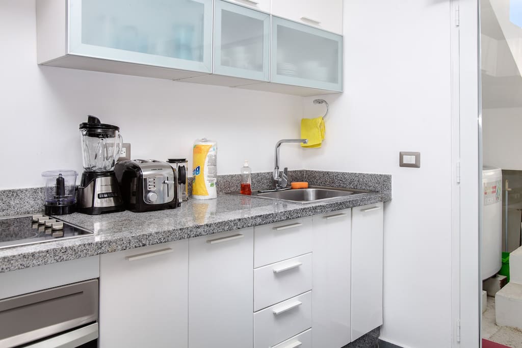 You can find all basic kitchen amenities. A very spacious kitchen will be good for a group vacation, you can cook here and use the kitchen with all amenities:
+ Water cooler
+ Kitchen stove
+ Big Fridge
+ Microwave
+ Toaster
+ Blender