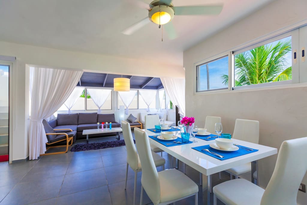 Luxury dining area. Here you'll have a big table for 6 persons, spacious kitchen with different kitchen utensils, ceiling fans!