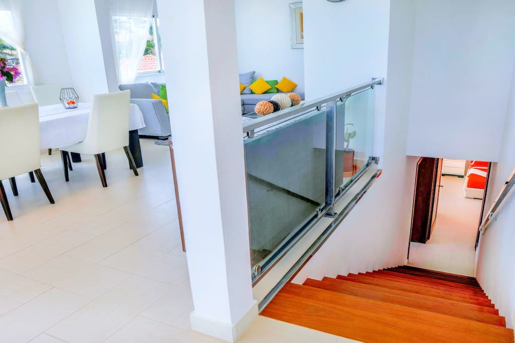 Each room is very stylish. Stairs will drive you to another cozy part of the apartment