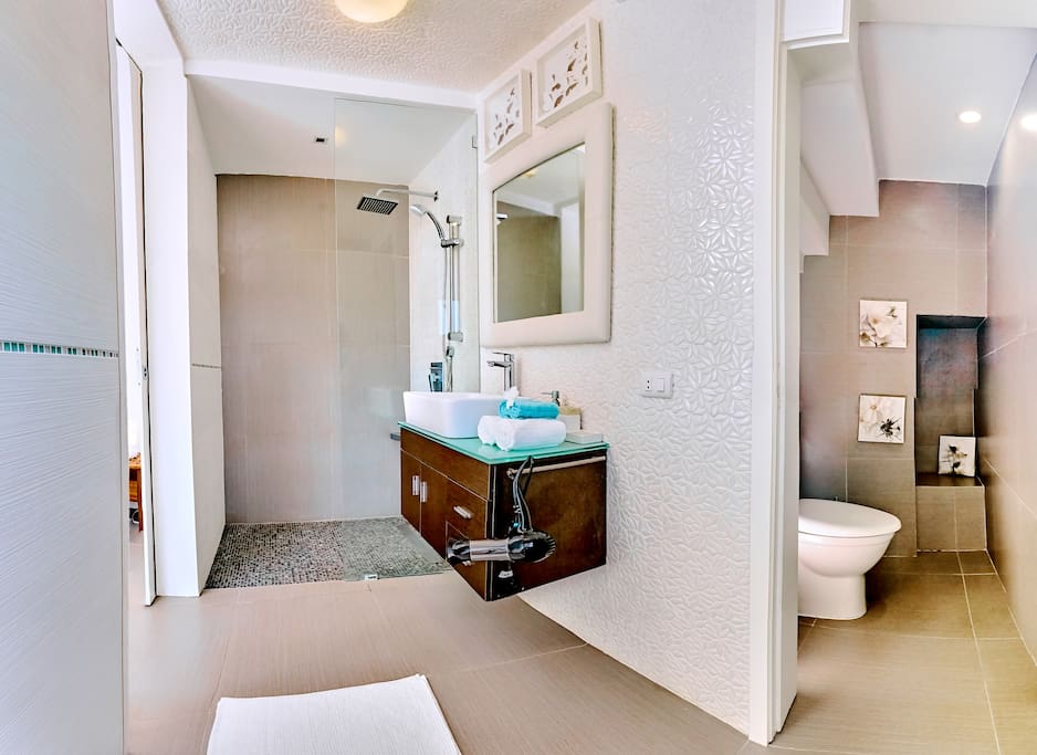 Take a shower in the bright clean and spacious bathroom. Relax after a long day at the beach.