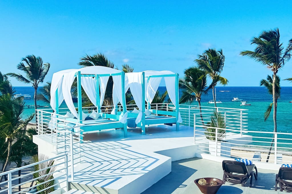 You will have a unique opportunity to lie on the canopy bed enjoying the views and the ocean breeze.