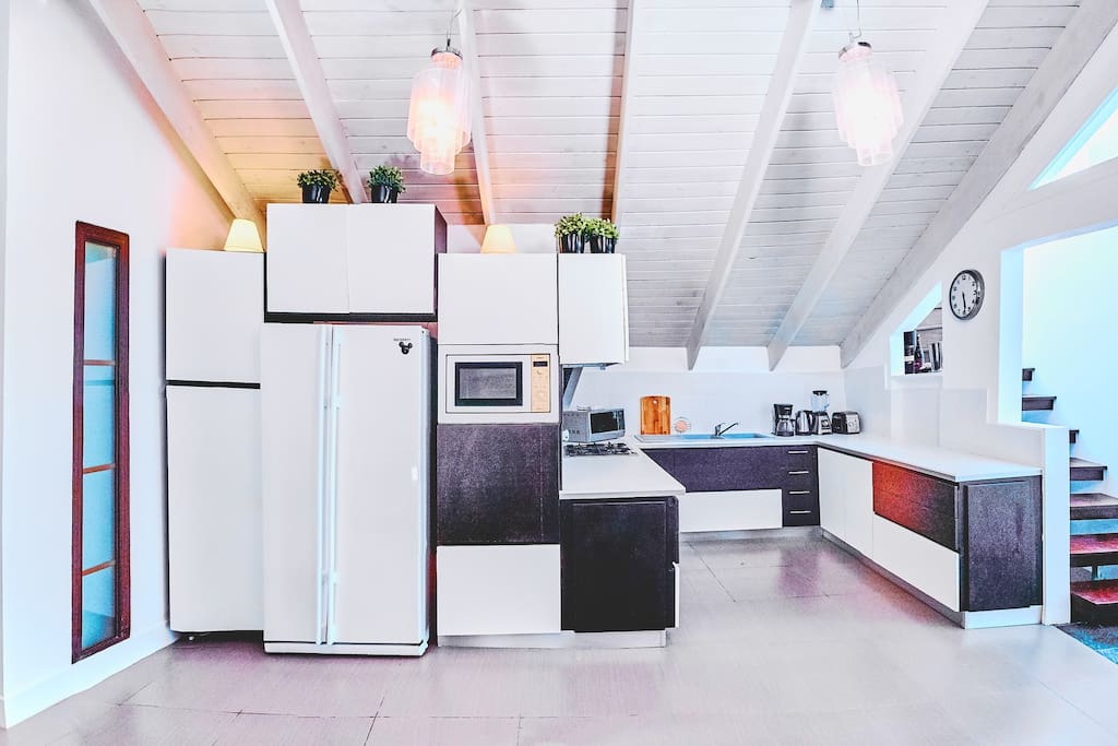 The kitchen has everything you need for cooking. You are free to use it.