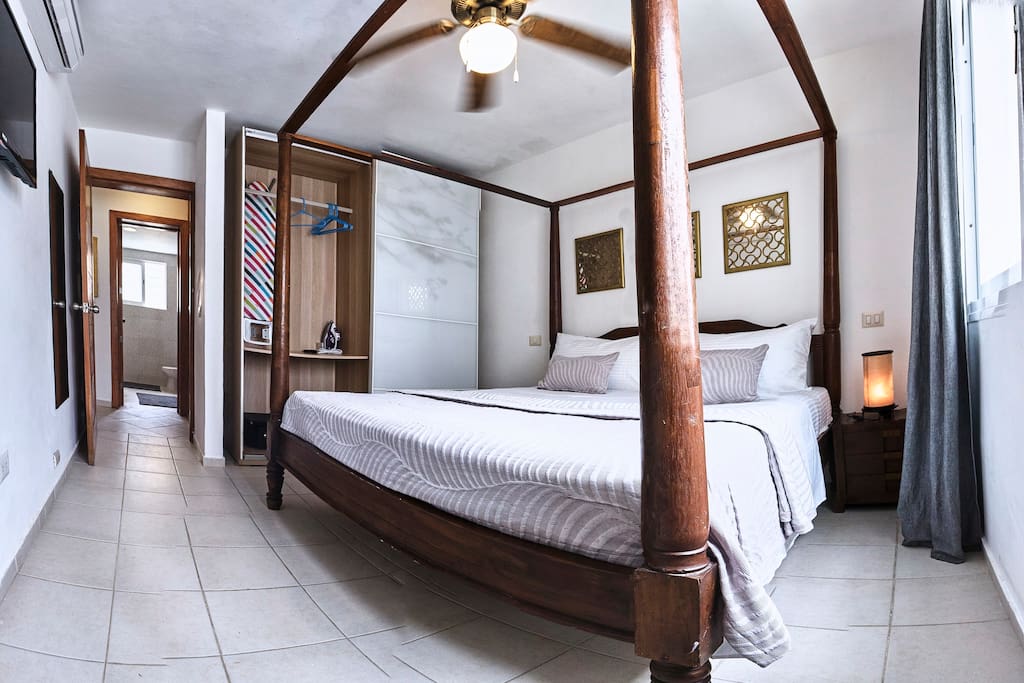 The second bedroom has a big cozy bed, where you'll sleep like a baby. The spacious wardrobe will be perfect for storing your personal things. En-suite bathroom is right near the room, where you'll find all basic essentials.