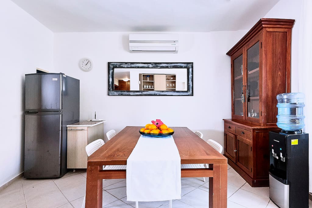 If you like to cook or just need a room to store your products, use your new well-equipped kitchen with a big table, fridge, water-cooler and cupboard with different kitchen utensils.