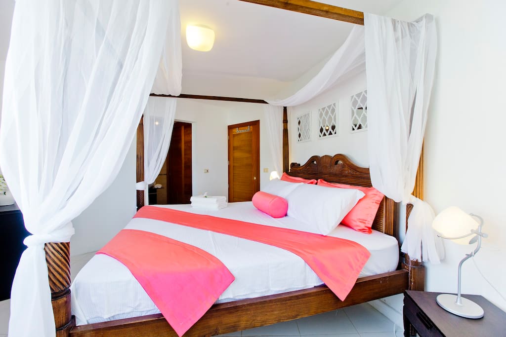 There is a big SUPER cozy bed for a royal sleep.