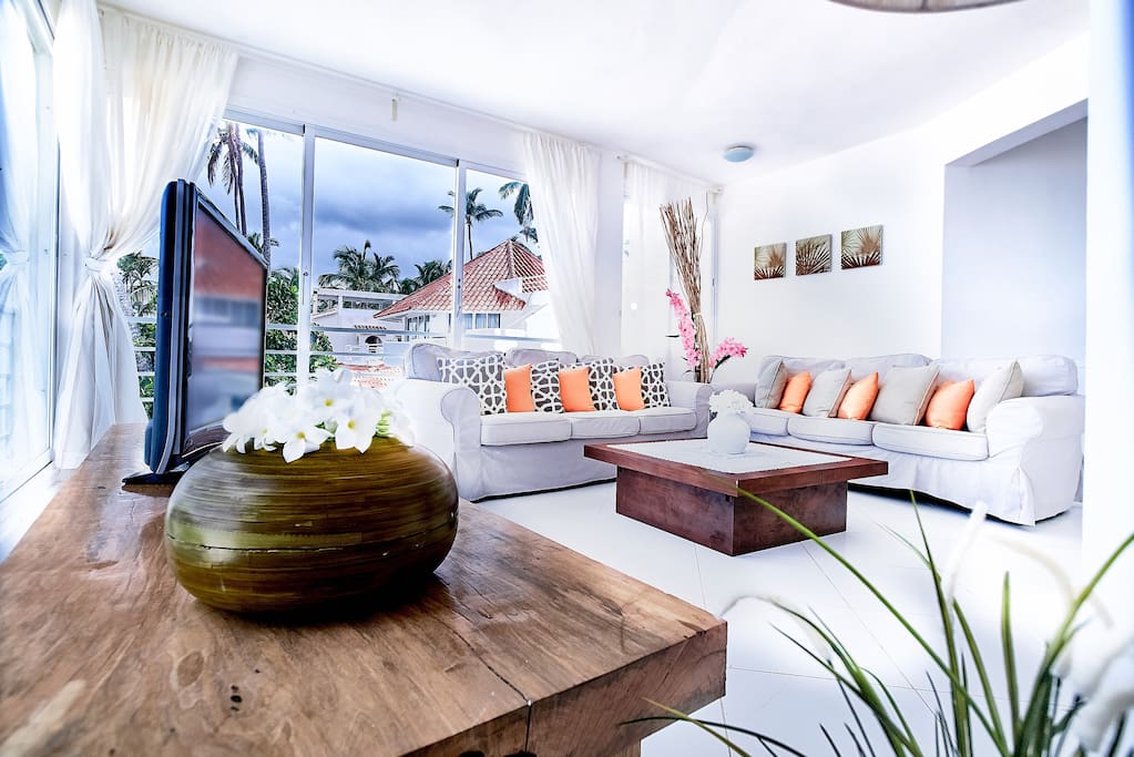 A large spacious living room provides enough space for everyone.