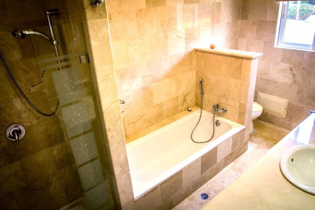 Functional clean bathroom, we provide a set of fresh towels for each guest.