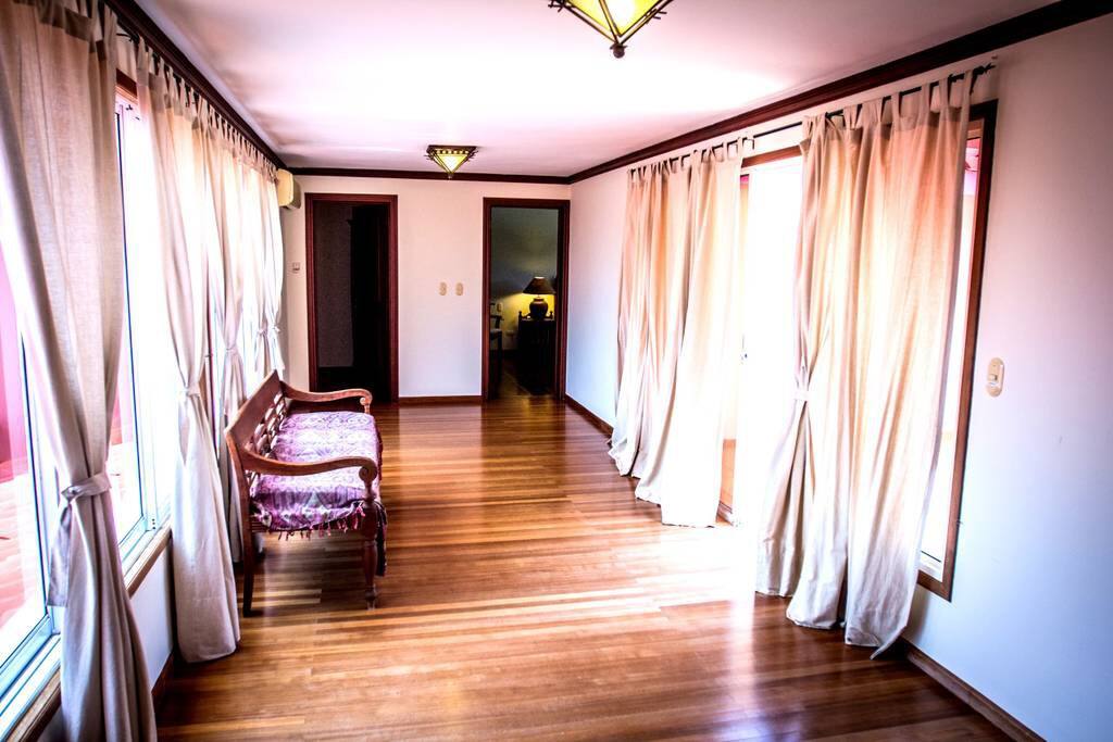 Wide hallway, all the rooms are very bright and full of sunlight.