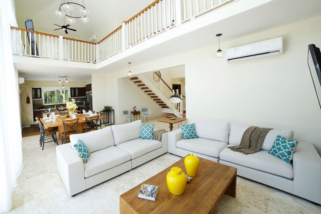 What a spacious and beautiful living room!