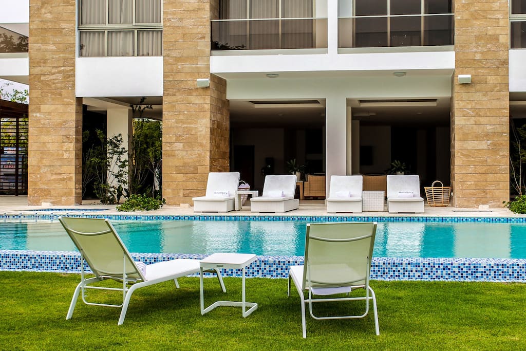Swimming pool, equipped with chaise-lounges right next to the apartment!