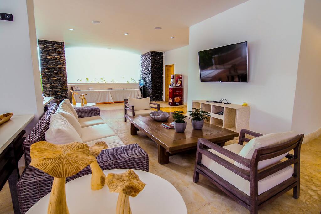 Nice interior details, cozy sofa and big TV. Enjoy your stay to the fullest!