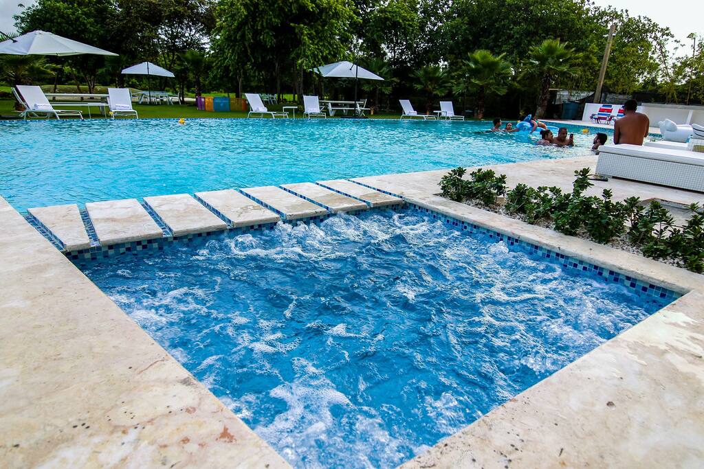 A large swimming pool and jacuzzi to enjoy the day. Book your perfect vacation with us!