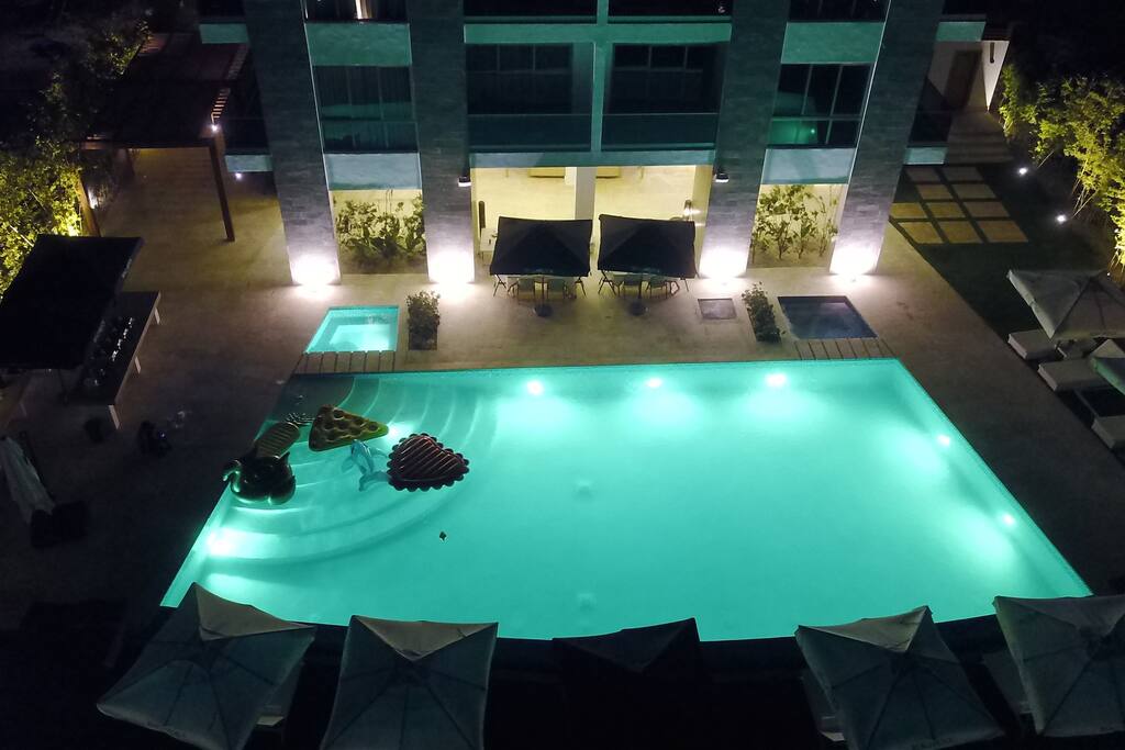 Pool view at night from the apartment