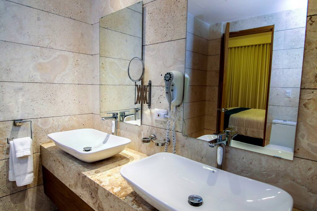 In the en-suite bathroom you will find a set of soft high-quality towels, bathroom essentials and a hair-dryer.