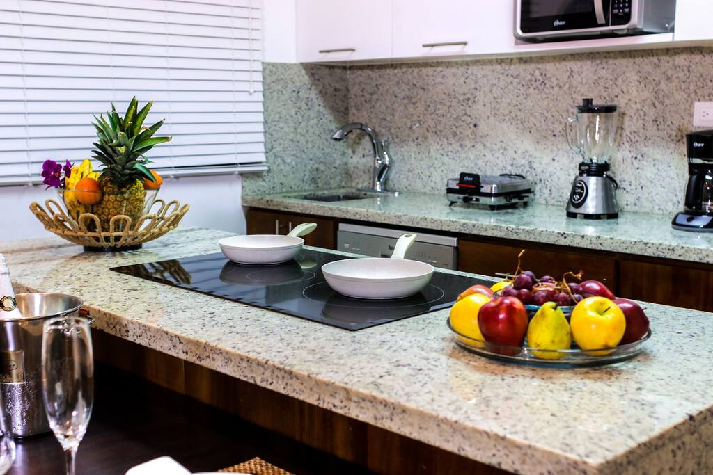 A dream of a chef: a spacious kitchen with new utensils.