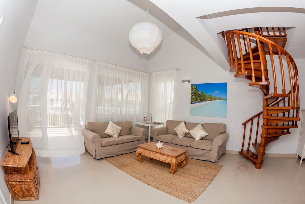 Spend time having interesting conversations with your loved ones on these cozy sofas.