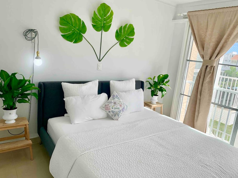 Recharge your batteries on this large and comfortable bed with soft pillows and fresh linen.