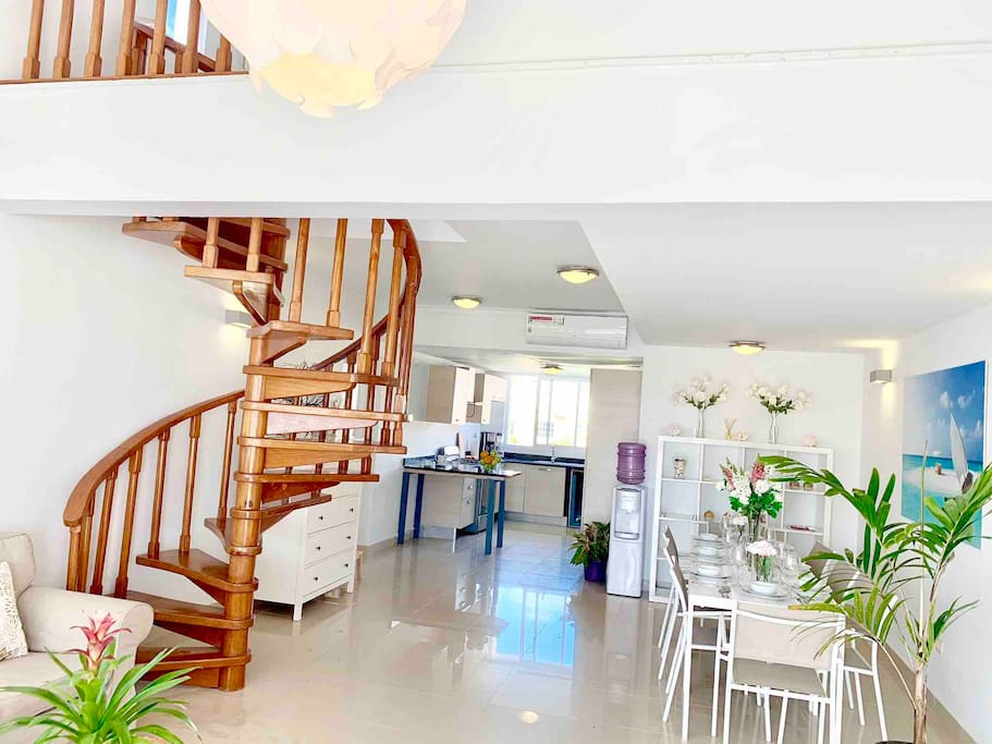 There is a dining area with a large table. Cook breakfast yourself and gather at the table.