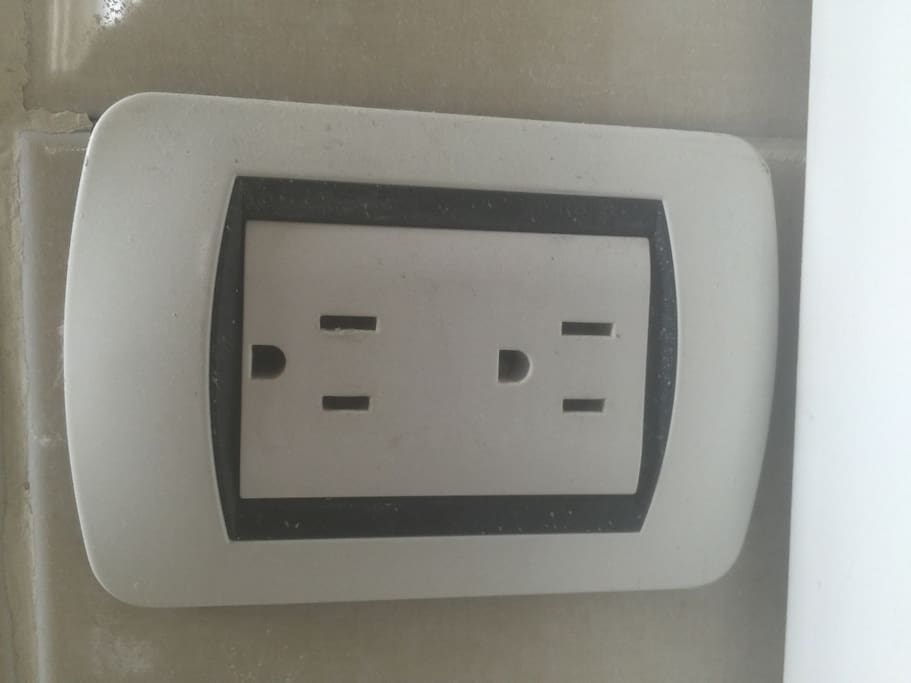 Here in the Dominican Republic we have regular US sockets and regular plugs.